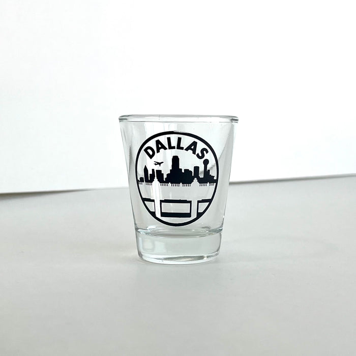 Triple Underpass Shot Glass featuring a design that showcases the Dallas skyline. This Texas themed gift is perfect for collectors and makes a great souvenir from Texas. Ideal for anyone looking for unique Texan gifts or Dallas souvenirs.