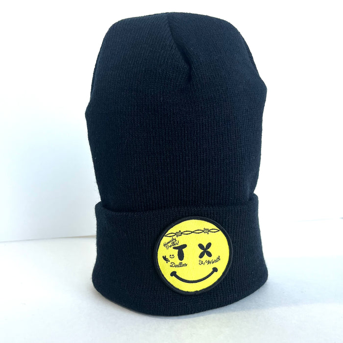 Smiley Face Beanie in black knit with a fun yellow patch, ideal for those looking for Texas Made Gifts and unique souvenirs from Texas, showcasing a playful Texan vibe.
