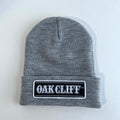 Oak Cliff Beanie, a gray beanie with a hand-stitched patch, perfect for cozy wear. A great Texas themed gift, showcasing Texas Made Gifts, ideal as souvenirs from Texas and as a Dallas souvenir for proud Texans.