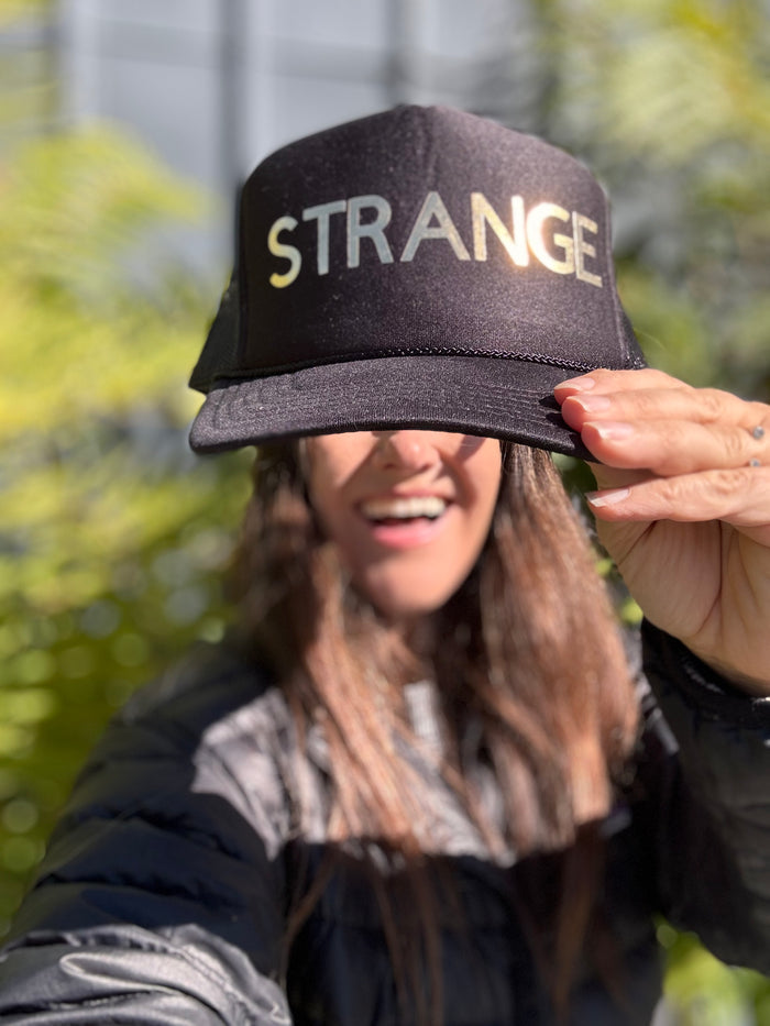 STRANGE trucker hat