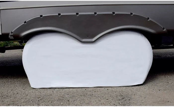 White Vinyl ADCO Double Axle Tyre Gard Installed on RV - Side View | United RV Parts