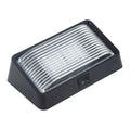Black RV Porch Light with Switch and Clear Ribbed Lens - Angled View | United RV Parts