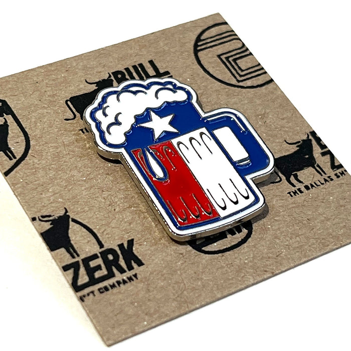 Close-up of the Beer Foam Enamel Pin featuring a colorful beer mug, a great choice for Texas themed gift lovers. This Texas Made Gift makes for an awesome souvenir from Texas, showcasing your pride as a Dallas souvenir or texan gift.