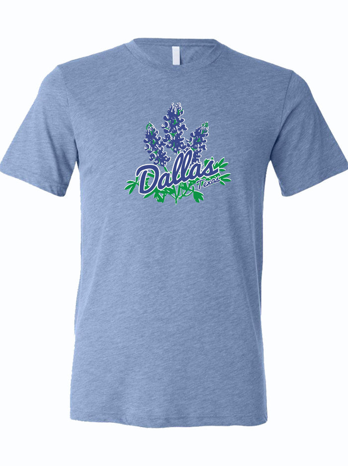 Light blue tshirt with a graphic image of bluebonnets and the text "Dallas, Texas."