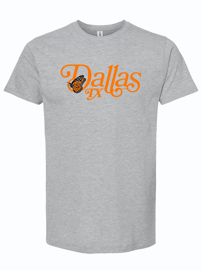 Light gray tshirt with a graphic of a monarch butterfly and orange text reading "Dallas Tx."
