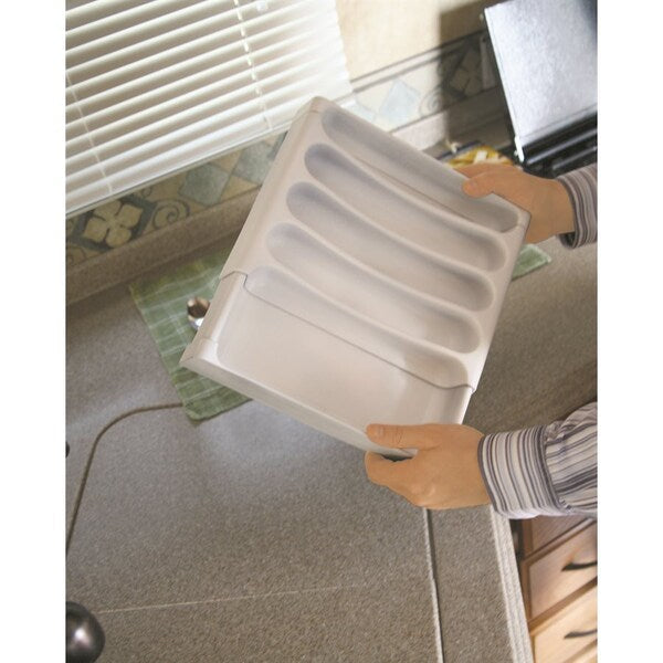 White Camco Adjustable Cutlery Tray Held by Person Showing Divider Compartments - In-Hand View | United RV Parts