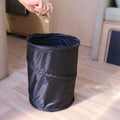 Black Nylon Camco Mini Pop-Up Utility Container 42903 in RV Interior - Lifestyle View | United RV Parts
