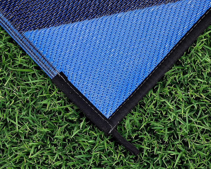 Blue Woven Polypropylene Camco Outdoor Mat Corner and Black Binding Detail | United RV Parts