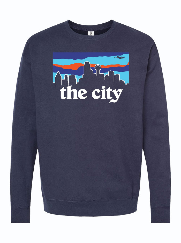City Skyline Crewneck Sweater featuring a vibrant skyline design and the phrase 'the city'. Perfect as a Texas themed gift, a stylish representation of Dallas, and an ideal souvenir from Texas. Great for those looking for unique Texan gifts or Texas Made Gifts.