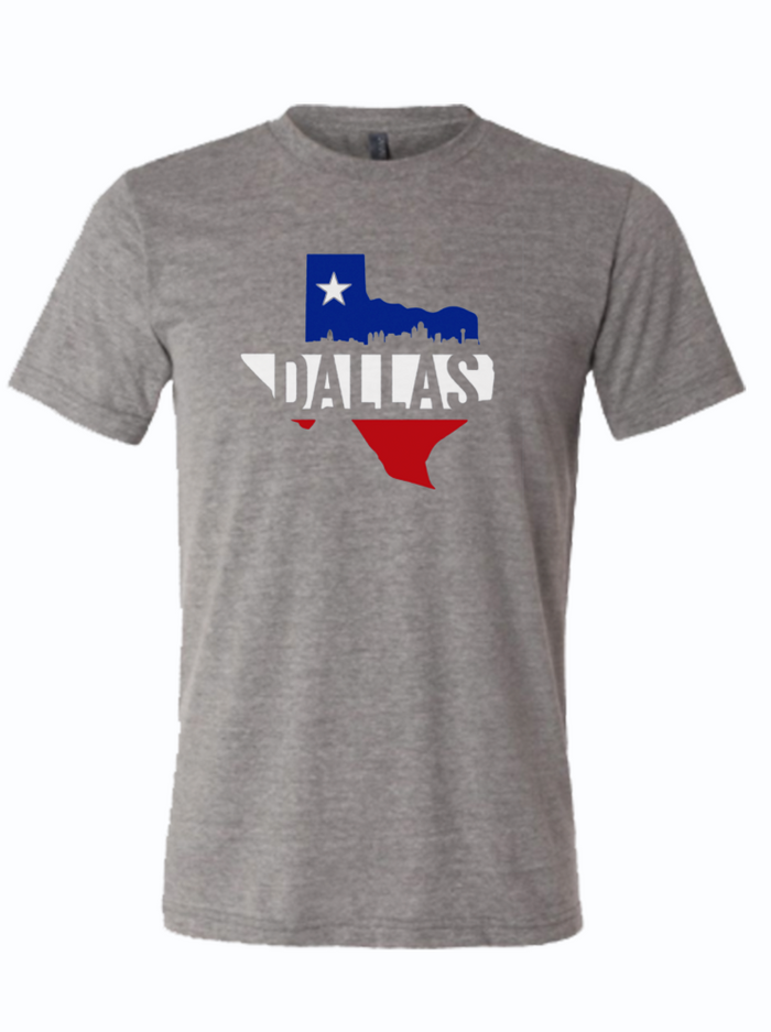 Gray tshirt with a graphic design of the shape of Texas and the text "Dallas" written across the middle.