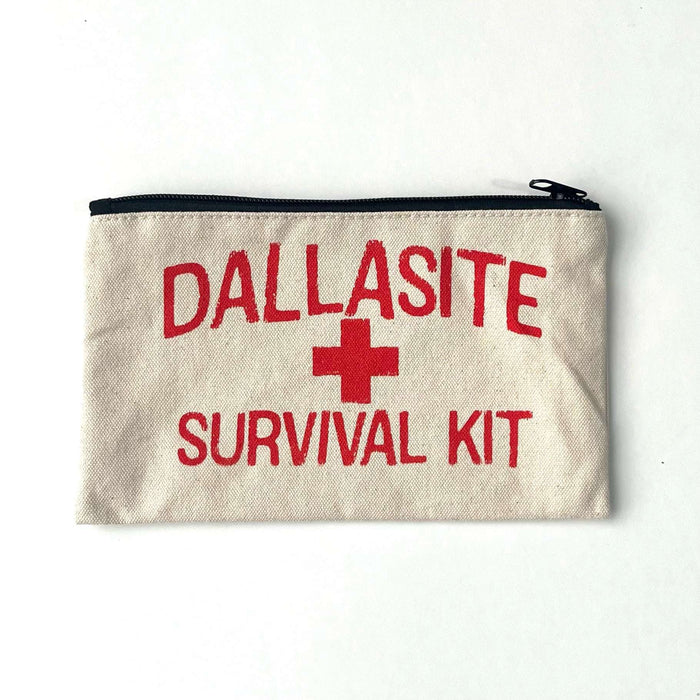 Dallasite Survival Kit Pencil Bag featuring a bold red 'SURVIVAL KIT' design on a natural canvas background, perfect for storing your essentials. This Texas themed gift is a great souvenir from Texas, highlighting unique Texan gifts made with quality craftsmanship.