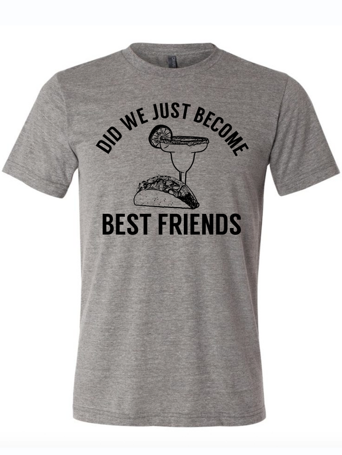 Light gray tshirt with graphic design of a margarita and taco and text reading "did we just become best friends" in black letters.