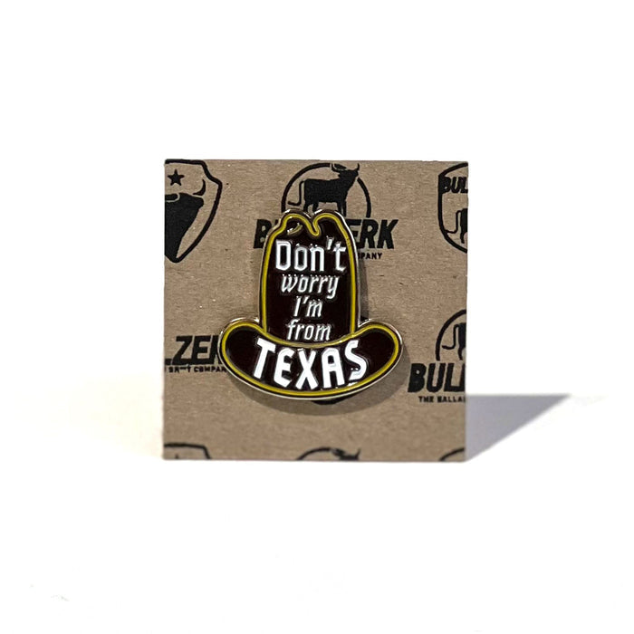 Don't Worry Enamel Pin featuring a cowboy hat and text 'Don't worry I'm from Texas', perfect Texas themed gift, Texas Made Gifts, souvenirs from Texas, dallas souvenir, and texan gifts.