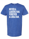 Royal blue tshirt with text reading "never a lakers fan. forever a Luka fan" in white letters.