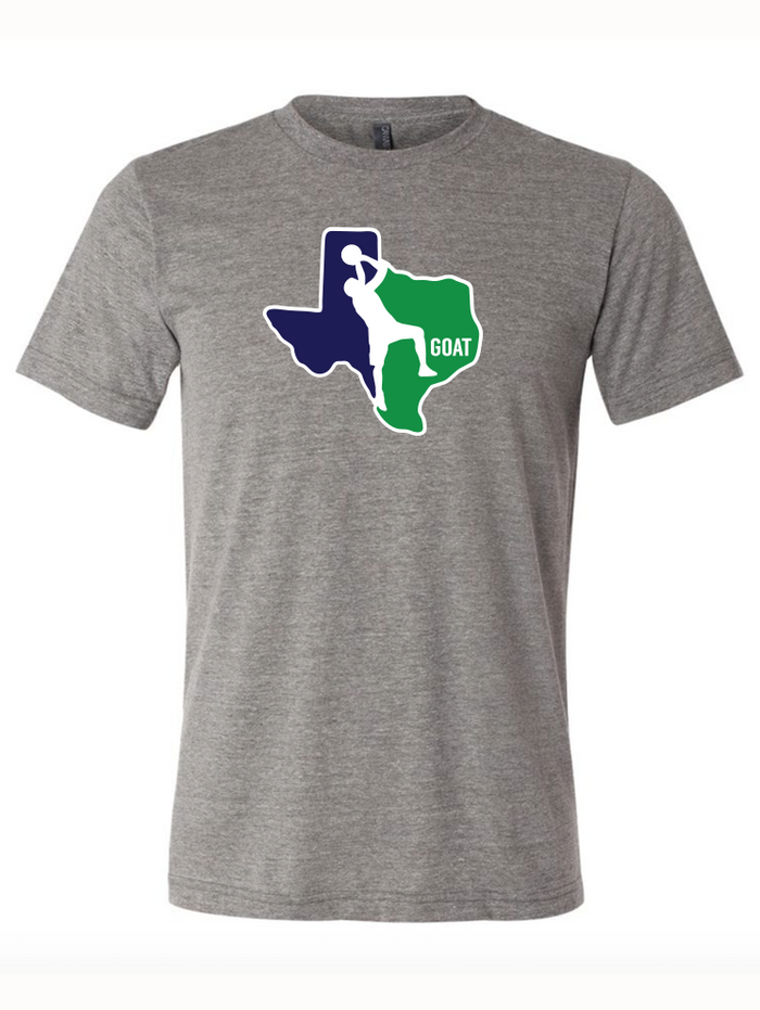Gray tshirt with a graphic design of a basketball player silhouetted in the shape of Texas and the text "GOAT."