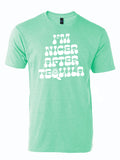 Mint green shirt that reads "I'm nicer after tequila" in white letters.