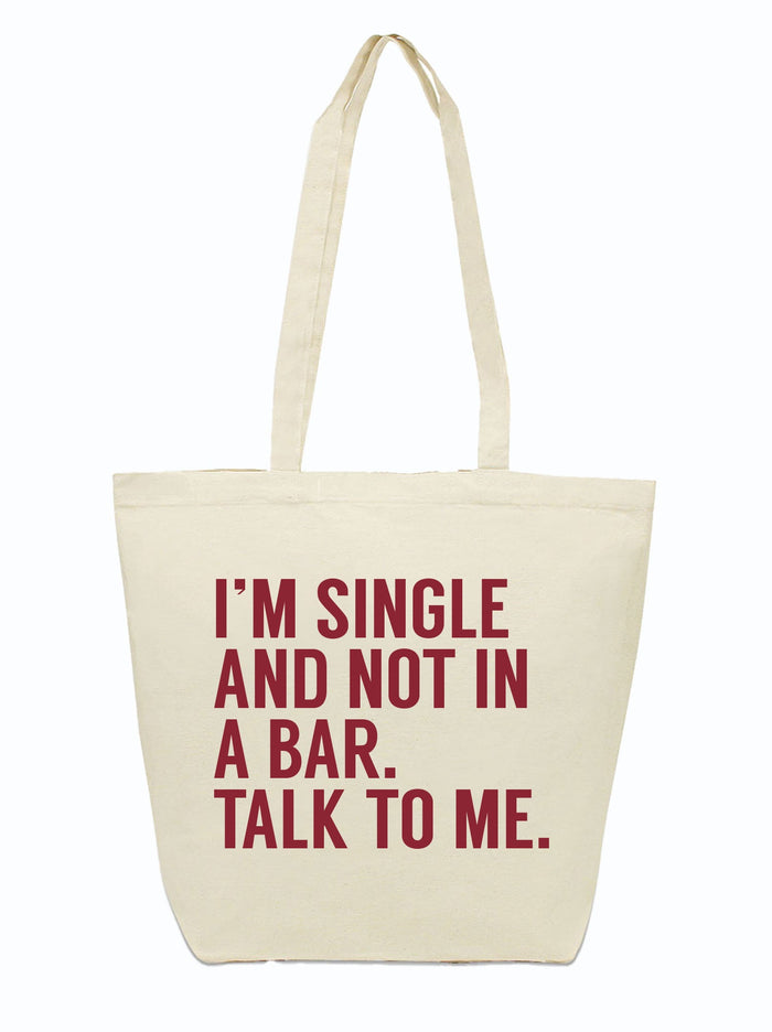 I'm Single And Not In A Bar Tote Bag, perfect for grocery shopping or farmers markets. A fun Texas themed gift, ideal for anyone looking to add a touch of humor to their errands. Great choice among Texas Made Gifts and souvenirs from Texas for that sassy Texan vibe, making it a cool dallas souvenir or unique texan gifts.