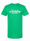 I'm the Drunk One, It's Me t-shirt in vibrant green color. This fun and casual shirt makes a perfect Texas themed gift, ideal for anyone looking to add some humor to their wardrobe. A must-have among Texas Made Gifts, it's a great souvenir from Texas for friends who love a good laugh. Perfect for Texans or as a unique Dallas souvenir.