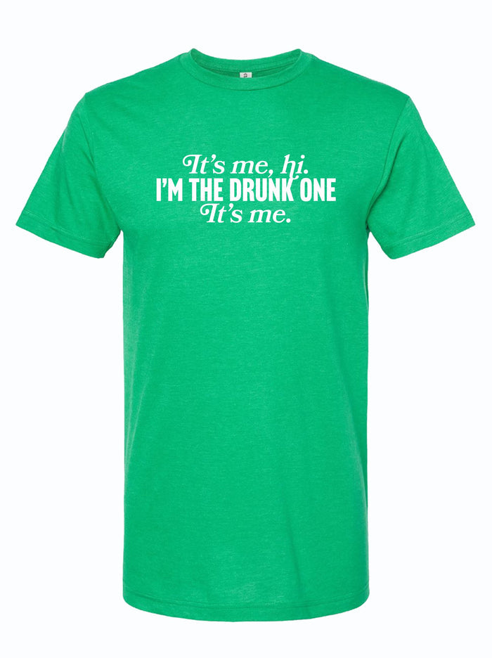 I'm the Drunk One, It's Me t-shirt in vibrant green color. This fun and casual shirt makes a perfect Texas themed gift, ideal for anyone looking to add some humor to their wardrobe. A must-have among Texas Made Gifts, it's a great souvenir from Texas for friends who love a good laugh. Perfect for Texans or as a unique Dallas souvenir.