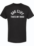 Black youth t-shirt with 'Oak Cliff That's My Hood' text, perfect for kids who love Texas pride. A great Texas themed gift, this shirt represents Dallas souvenirs and makes for unique Texan gifts.