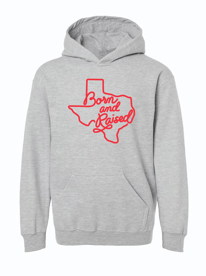Kids Born and Raised Pullover Hoodie featuring a fun Texas outline design in red on a gray background. This cozy hoodie makes a great Texas themed gift and is perfect for those looking for Texas Made Gifts, souvenirs from Texas, or a dallas souvenir. It's a must-have for any young Texan!