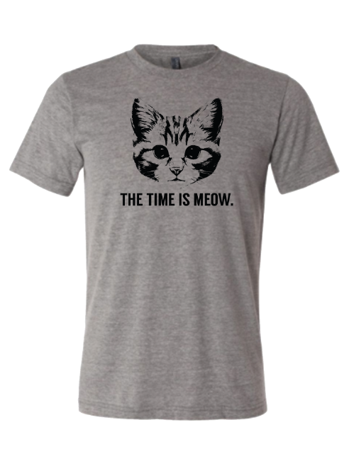 A gray youth t-shirt featuring a cute cat face design with the phrase 'THE TIME IS MEOW.' This stylish tee makes a great Texas-themed gift, perfect for kids and families, as well as ideal souvenirs from Texas. Explore more Texas-made gifts and unique Dallas souvenirs with this fun and playful shirt!