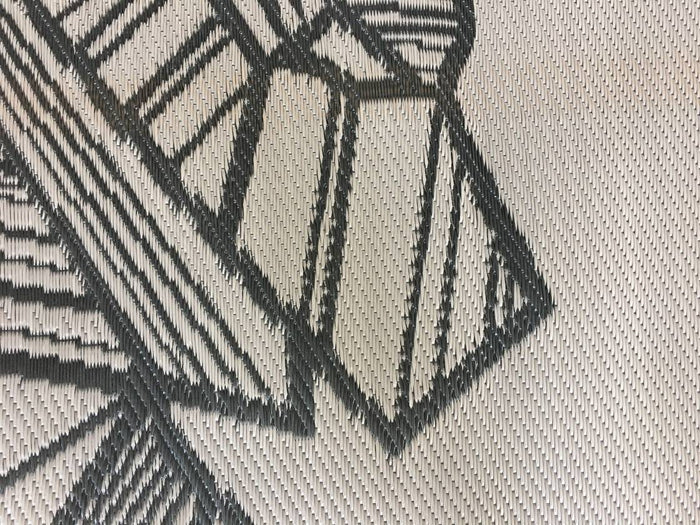Grey Woven RV Mat Fabric Texture with Geometric Bear Pattern Detail | United RV Parts