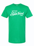 Green tshirt with graphic of text reading " Let's get shite faced y'all" in white letters.
