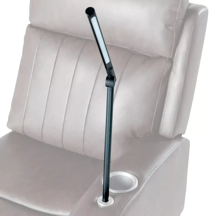 Black Thomas Payne LED Reading Light mounted on beige RV recliner armrest - Lifestyle View | United RV Parts