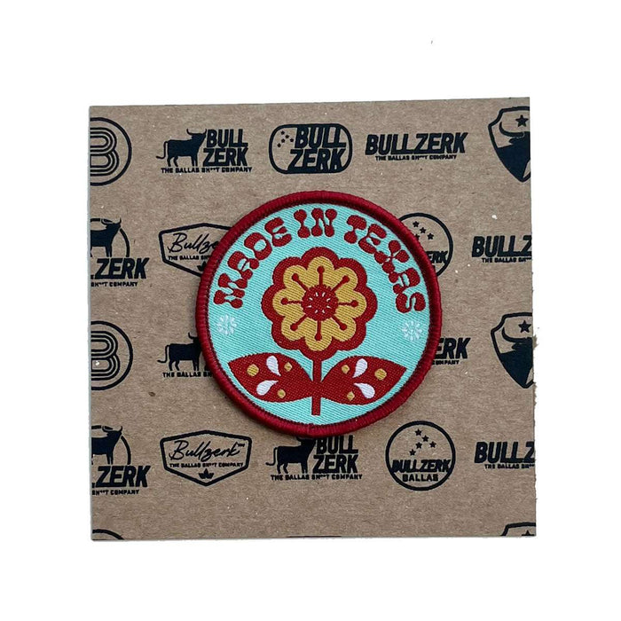 Made in Texas Flower Patch, a colorful embroidered patch featuring a floral design, perfect for decorating jean jackets or other fabric. This Texas themed gift highlights the charm of Texas with its vibrant colors, making an ideal Texas Made gift, souvenir from Texas, dallas souvenir, or texan gift.
