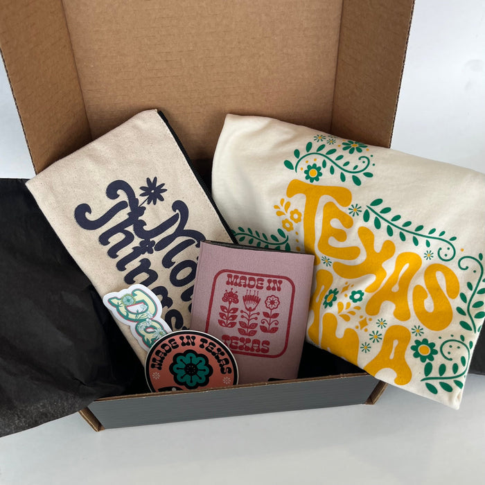 Mother's Day Gift Box featuring a Bullzerk Texas Mama t-shirt and an assortment of Dallas and Texas-themed small products.