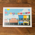 OAK CLIFF BUILDINGS Art Print featuring a colorful illustration of buildings in Oak Cliff, Texas. This vibrant print is perfect for a Texas themed gift, showcasing local culture and charm, making it an ideal Texas Made Gift or Dallas souvenir for anyone who loves Texan gifts.
