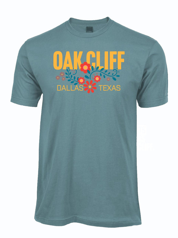 featuring “Oak Cliff” text with colorful floral artwork and “Dallas, Texas” printed underneath.