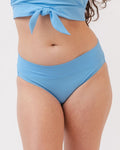 Photo of a woman wearing a light periwinkle blue classic swim bottom