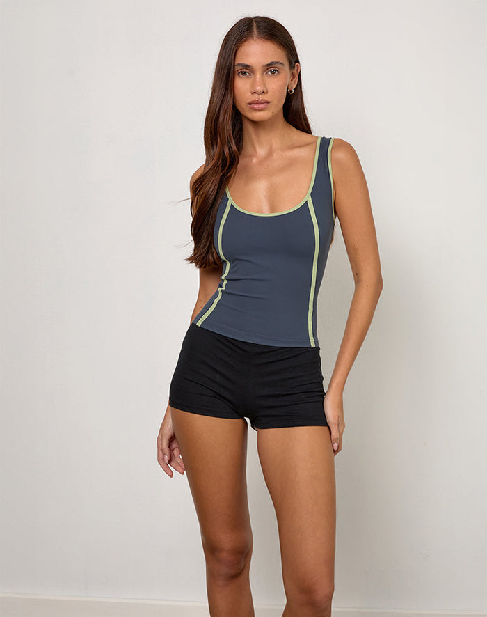 Image of Pilon Vest top in Navy with Sage Binding