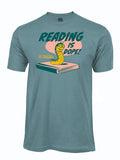 Slate blue tshirt with a graphic of a caterpillar on a book and 'Reading is Dope' text.