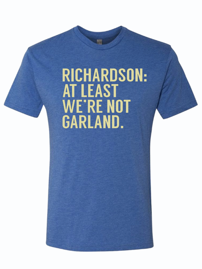 Royal blue tshirt with text reading "richardson: at least we're not garland" in yellow letters.