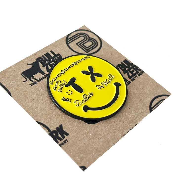 Smiley Face Enamel Pin featuring a bright yellow smiley design with the text 'Dallas Ft. Worth,' perfect as a Texas themed gift. This fun accessory is an ideal choice for Texas Made Gifts and makes a great souvenir from Texas, especially for anyone looking for unique dallas souvenirs or texan gifts.