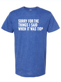 Royal blue tshirt with text design reading "Sorry for the things I said when it was 110 degrees" in white letters.