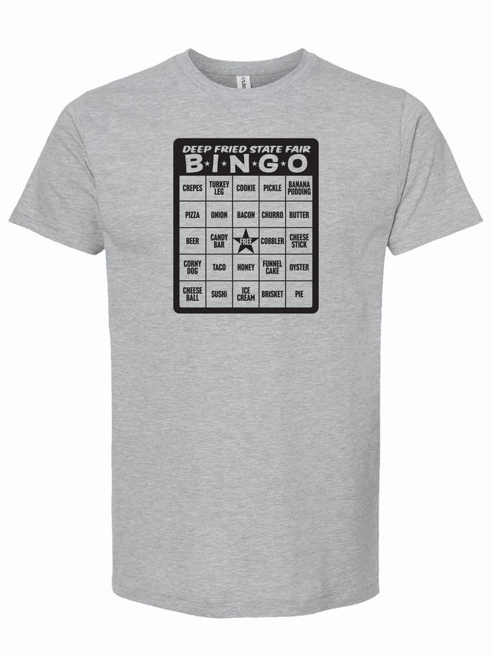 State Fair Bingo graphic printed on a grey unisex fine jersey tee, perfect as a Texas themed gift. This shirt features a fun bingo layout inspired by popular state fair foods, making it an ideal souvenir from Texas. Great for anyone looking for Texas Made Gifts, especially as a Dallas souvenir or a tribute to Texan gifts.
