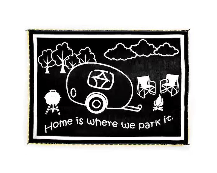 Black RV Outdoor Mat LRVH8111 - Front View, Campsite Graphic & Home Is Where We Park It | United RV Parts