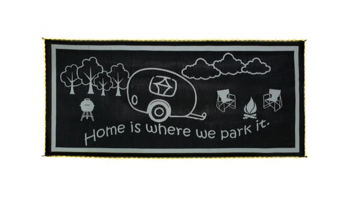 Black RV Outdoor Mat 8x18 Flat Lay, Home Is Where We Park It Design | United RV Parts