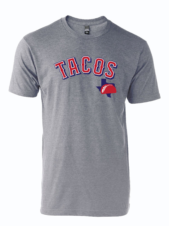 Gray tshirt with graphic design that reads "TACOS" in a bold, sports-themed font and a Texas silhouette with a Taco over it underneath the text.