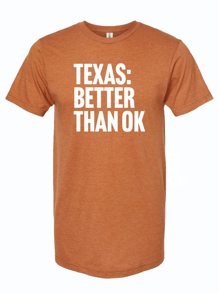 Rust orange tshirt with text reading "TEXAS: BETTER THAN OK" in white letters.