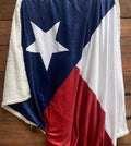Cozy Texas Blanket featuring the Texas flag design, perfect for cozying up in style. Ideal as a Texas themed gift or a Dallas souvenir, this soft fleece blanket is a must-have Texas made gift for any Texan.