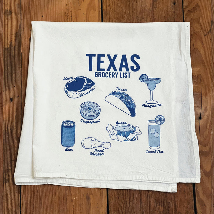 Texas Groceries Tea Towel featuring a playful design with Texas food items like steak, tacos, and sweet tea, perfect as a Texas themed gift, Texas Made Gifts, and a unique Dallas souvenir for those who love Texan gifts.