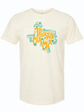 Cream tshirt with a graphic design of the shape of texas made out of floral designs and the text "Texas Mama" in yellow and green.
