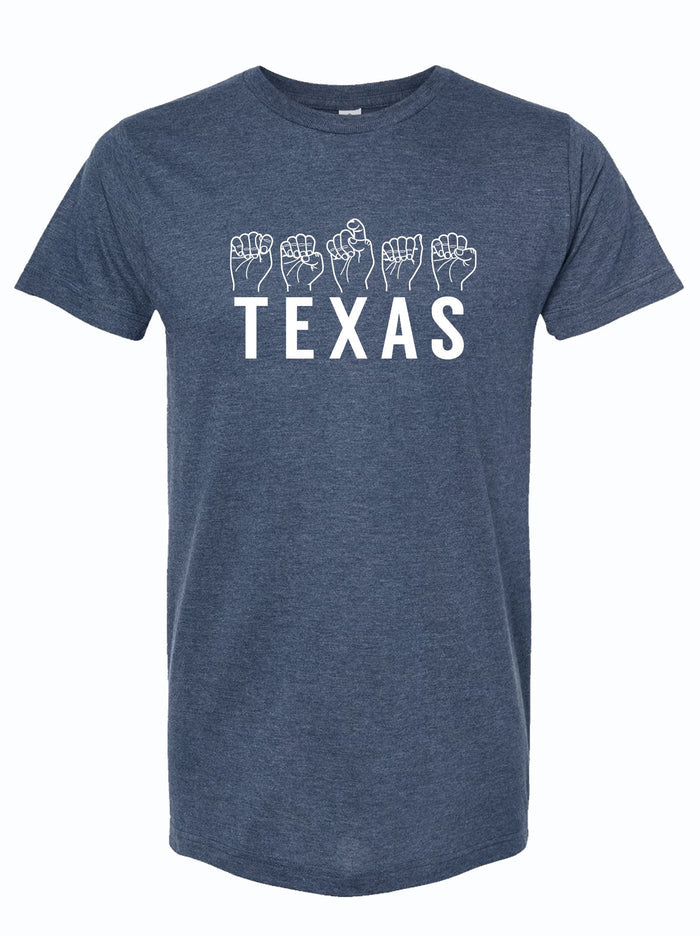 Denim blue tshirt with a graphic design of the letters T-E-X-A-S and illustrated hands showing the sign language for each letter.