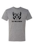Gray tshirt with a graphic design of the face of a cat with text underneath reading "The time is meow" in black letters.