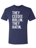 Denim blue tshirt with text reading "The Ceedee Rollin, They Hatin" in white letters.